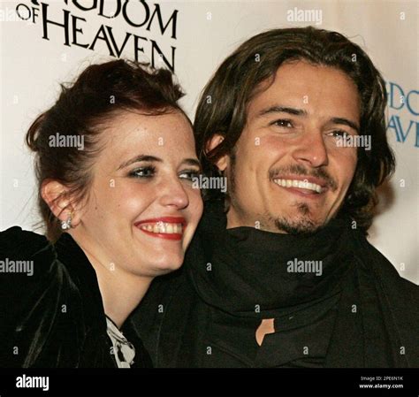 Orlando Bloom, right, and Eva Green pose for photographers before ...