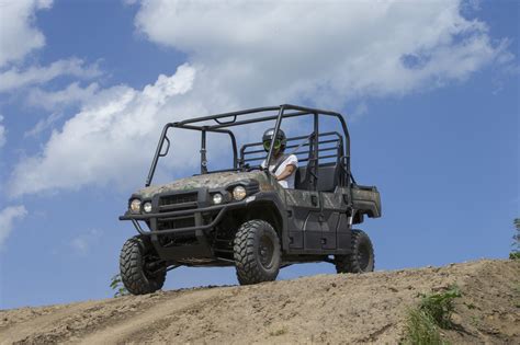 Kawasaki MULE PRO-FXT Camo Action Shot (10) - ATVConnection.com