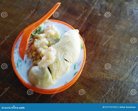 Cendol Durian or Durian Dessert Closeup on Wooden Background.Cendol Durian is Malaysian Popular ...