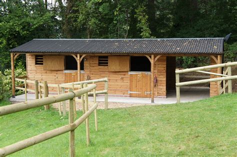 This stable block includes two 3.6m x 3.6m stables, a 3m x 3.6m covered walkway and a small ...