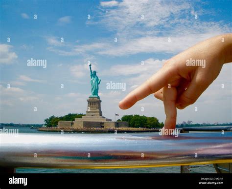 Dancing Fingers in front of the Statue of Liberty Stock Photo - Alamy