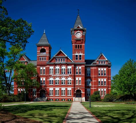 Red Building With Clock Tower · Free Stock Photo