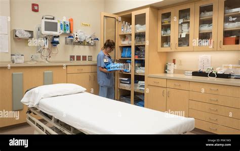 A hospital emergency room nurse stocks a cabinet with trauma supplies Stock Photo - Alamy