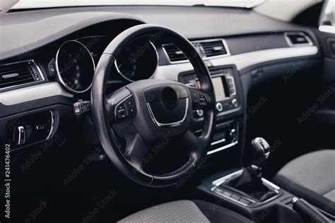 Steering wheel in a new car. Steering wheel with control buttons ...