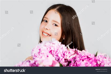 Portrait Smiling Little Girl Holding Flowers Stock Photo 1531828532 ...