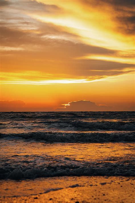 Silhouette Of The Beach During Golden Sunset. Photograph by Ellinnur Bakarudin - Pixels