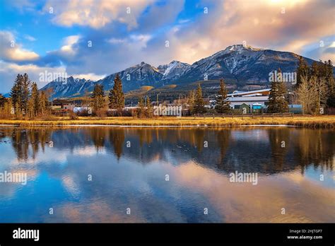 Sunrise Mountain Reflections In Canmore Stock Photo - Alamy