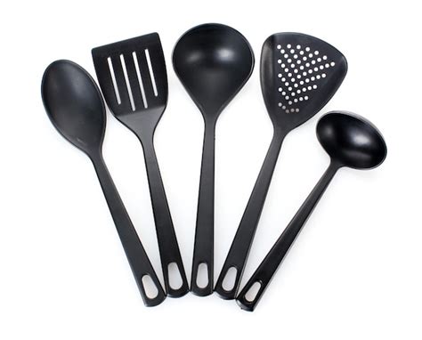 Premium Photo | Black kitchen utensils isolated on white