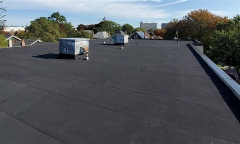 Flat Roof Installation - Alps Roofing & Construction