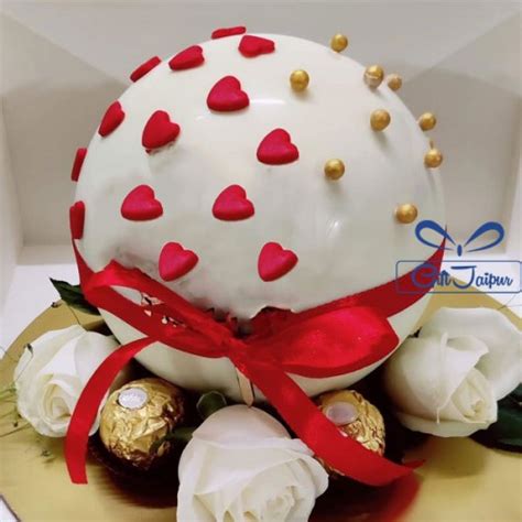 Send Designer white chocolate round shape pinata hammer cake online by GiftJaipur in Rajasthan