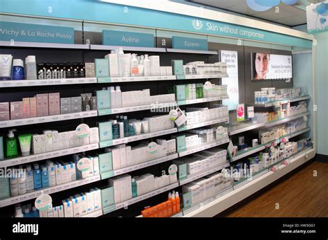 Skin care products on the shelves of a pharmacy shop, Avene, Vichy ...