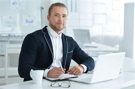 Premium Photo | Portrait of a business man with a laptop