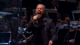 Watch Iron Maiden's Bruce Dickinson perform Deep Purple's Burn with an ...