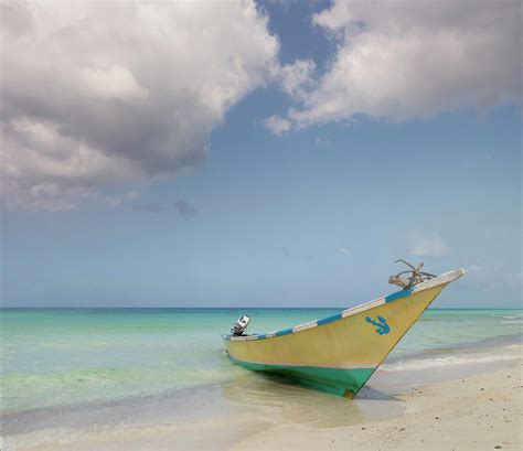 Boat Moored On Beach Photograph by John M Lund Photography Inc - Fine Art America