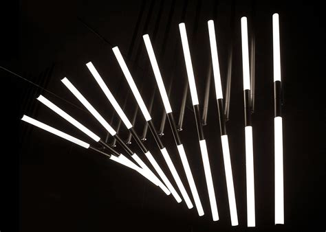 OMA debuts reconfigurable XY 180 lighting system made of rods and spotlights — Dezeen | Delta ...