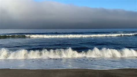 Early morning surf and surfers at Rockaway Beach (Rockaway Beach ...