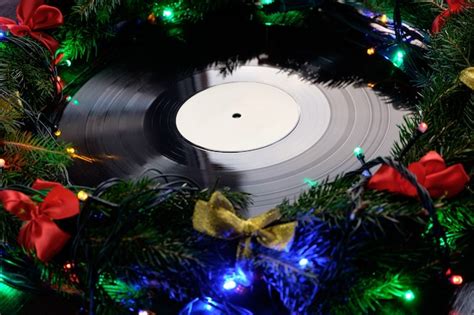 Premium Photo | Vinyl gramophone record in christmas style for christmas playlist flat view with ...