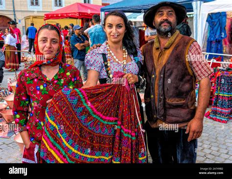 Amazing Gypsy family in Colorful gypsy costumes. Bohemian Gypsy Life at Sibiu Roma Festival ...