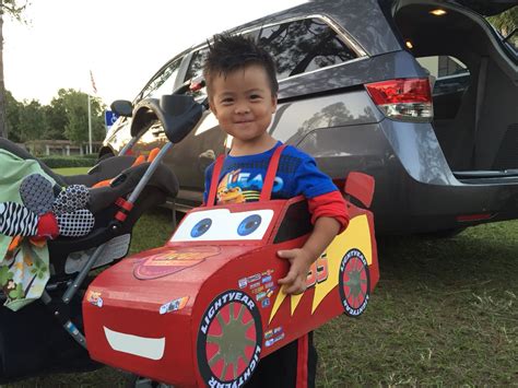 Wearing his homemade Lightning McQueen costume … | Lightning mcqueen ...