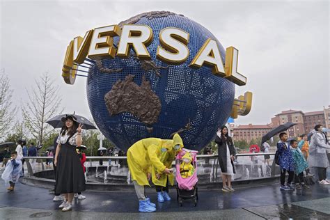 Universal Studios opens Beijing park under anti-virus curbs | AP News