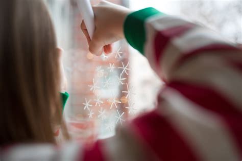 Draw a triangle, draw a snowflake! Here's a simple tutorial for winter window painting