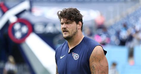 Titans' Taylor Lewan Carted Off Field After Suffering Knee Injury vs ...