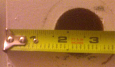 How do I drill a 2⅛ inch door knob hole over an existing 1½ inch hole? - Home Improvement Stack ...