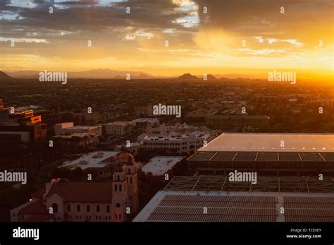 Phoenix, Arizona, skyline at sunrise. Camelback mountain in the ...