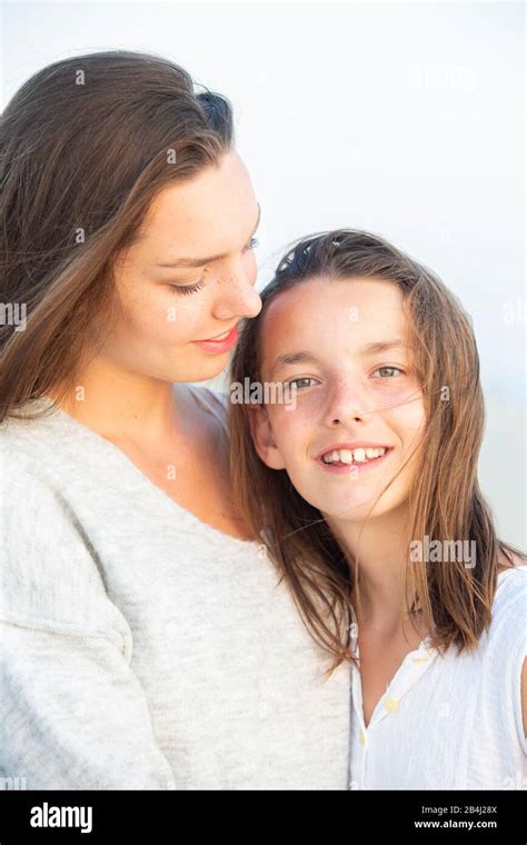 Siblings, portrait, hug Stock Photo - Alamy