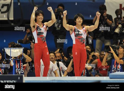 Kohei Uchimura and Koji Yamamuro (JPN) celebrate their victory of the ...