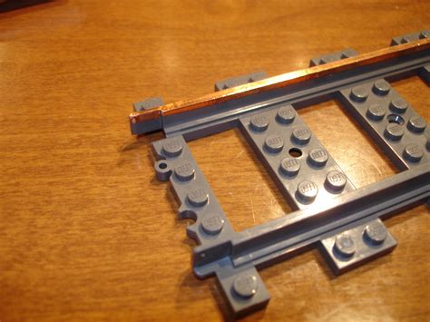 Make Plastic Lego Train Tracks Backwards Compatible with 9V and 12V Tracks