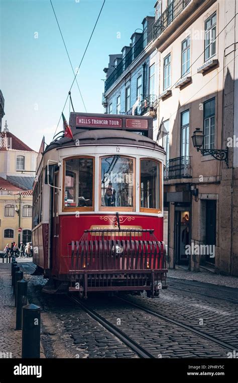 Old tram through the streets of beautiful Lisbon Stock Photo - Alamy