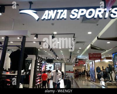 --FILE--Employees are pictured at a sportswear store of Anta in Shanghai, China, 24 September ...