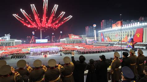 Kim Jong-un's daughter joins father in historic military parade, sparks ...