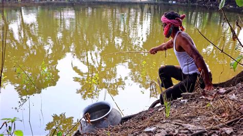 Fishing Video || Traditional boy fishing in village pond with hook || Village pond fishing - YouTube