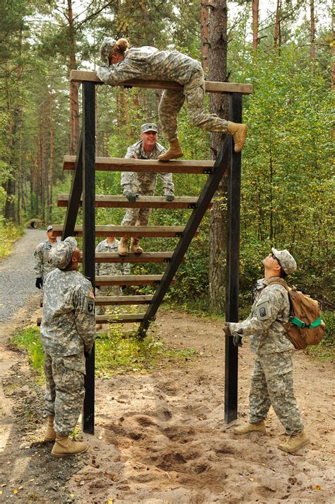 U.S. soldiers conduct obstacle course training at the Multinational ...