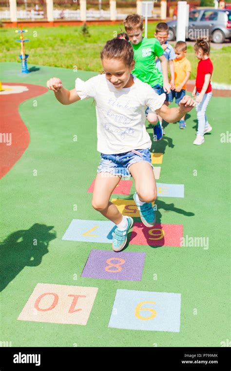 Hopscotch hop skip jump game hi-res stock photography and images - Alamy