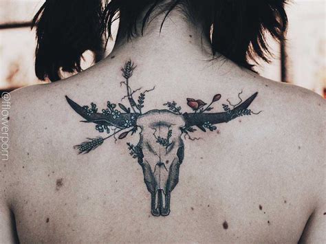 Longhorn skull and wildflowers tattoo on the upper back | Bull tattoos ...