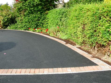 Tarmac driveway with block paving edging | Tarmac driveways, Garden slabs, Driveway landscaping