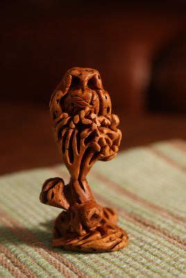 Spike is Best: Peach pit carving: rose and tree and owl | Peach pit, Carving, Seed art