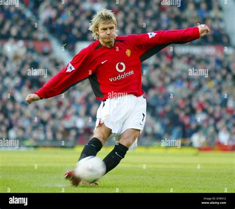 Manchester United's David Beckham scores his side's second goal against Portsmouth from a free ...