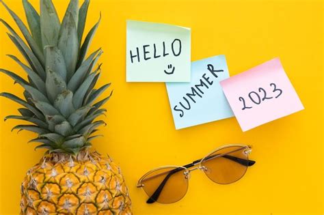 Premium Photo | Pineapple and coconut and sunglasses on a bright yellow background word hello ...