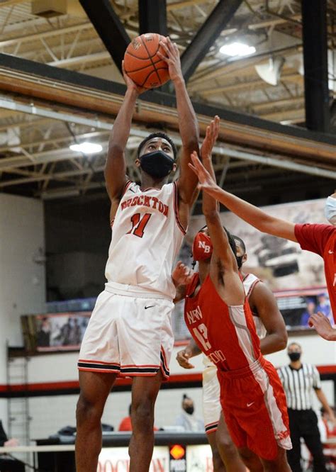 Brockton boys basketball, Debarros win in season debut