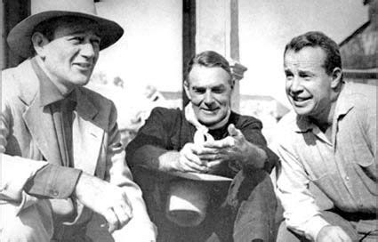 John Wayne, Randolph Scott and director Budd Boetticher on the set of “7 Men From Now” (‘56 ...