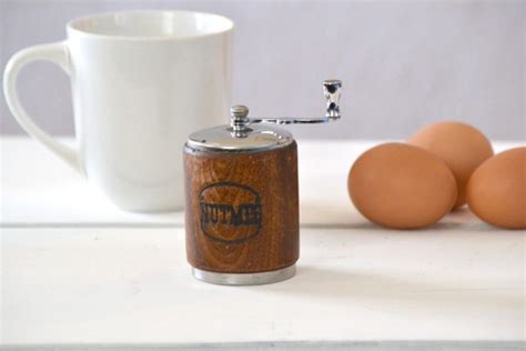 Vintage wood nutmeg grinder by George S. Thompson Corp.