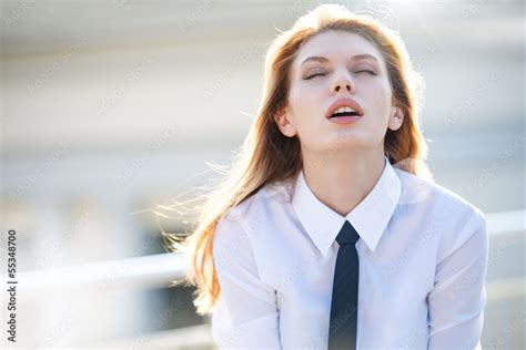 Delightful young woman in ecstasy Stock Photo | Adobe Stock