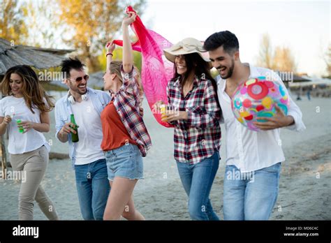 Happy friends laughing and smiling outdoors Stock Photo - Alamy