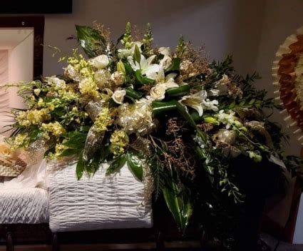 WHITE AND GOLD REST CASKET FLOWERS in Henderson, NC - The People's Choice D'Campbell Floral D ...