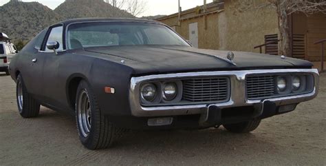 1974 Dodge Charger - 318 - V8 bored out 40 over with a custom racing cam and headers. Flat black ...