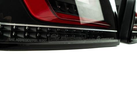 OLM Evolution Tail Lights (Clear Lens, Black Base, Red Bar) - 15+ WRX